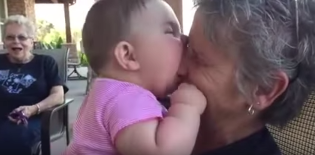 baby eats grandmas nose